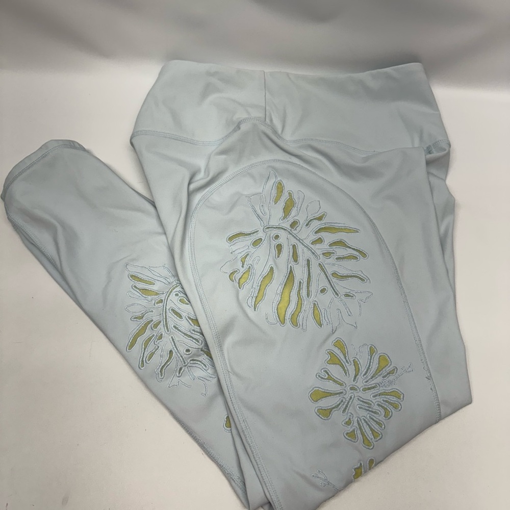 Free People MOVEMENT Palm Springs Lite Blue Leggings Yellow Mesh Cutouts Sz M